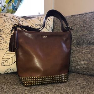 Coach legacy studded duffle bag whiskey and brass